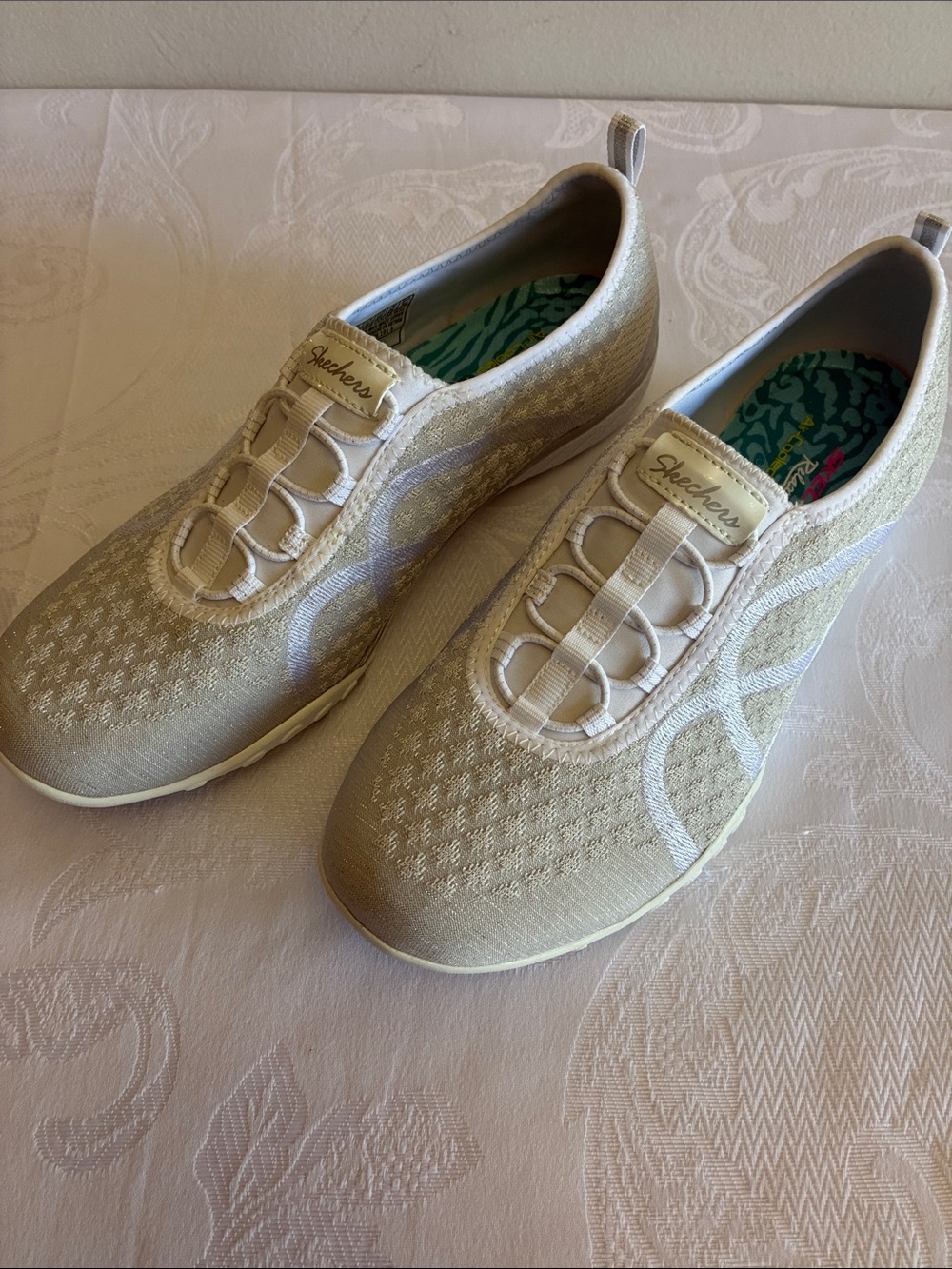Skechers Women’s Slip-On Sneakers in Light Gold and Cream